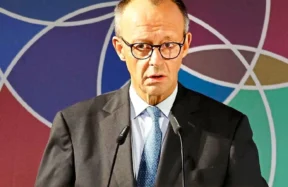 Almanya Başbakanı Merz, göç ve Belém çıkışlarıyla hem Berlin'de hem Brezilya'da protestolarla karşı karşıya